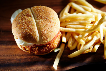Chicken burger with fried potato 