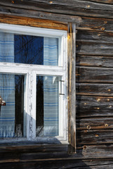 Window on old log house
