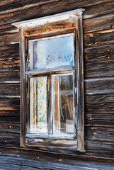 Window on old log house