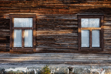 Windows on old log house