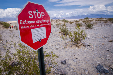 DEATH VALLEY, CALIFORNIA: A sign in Death Valley National Park warns hikers of extreme heat...