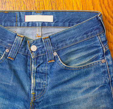 indigo jeans with a button