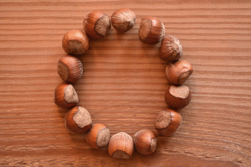 the letter O shaped with hazelnuts