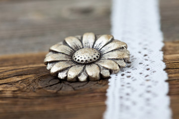 vintage metal button flower and lace ribbon