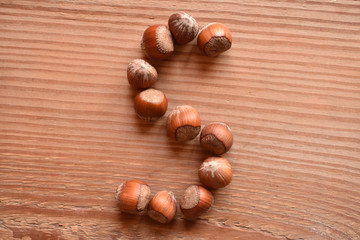 the letter S made with hazelnuts