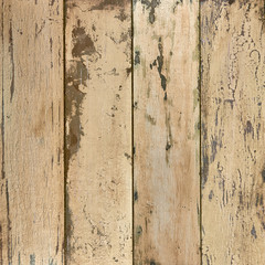 Yellow grungy textured plank background from top view