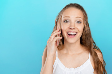 Fototapeta premium Young Woman Using a Cell Phone