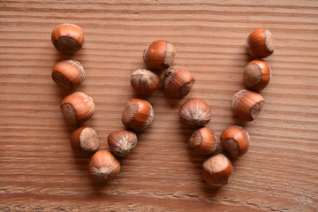 the letter W made with hazelnuts