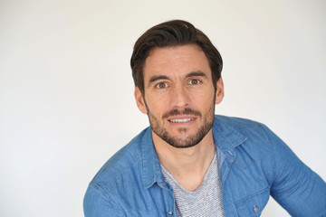 Obraz premium Portrait of very handsome casual man on white background