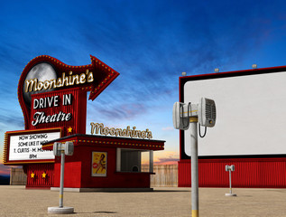 Traditional drive-in movie theater cinema at dusk