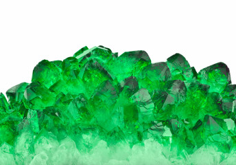 bright green emeralds crystals isolated on white