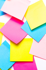 Many colorful sticky notes on white background