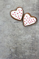 Obraz premium Valentines day background with heart shaped frosted cookies