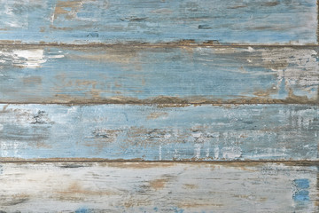 Fototapeta premium Blue grungy textured plank background 