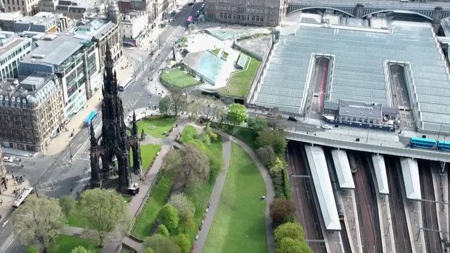 Edinburgh city historic Waverley Train Station Rail way sunny Day Aerial shot