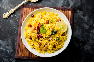 Lemon Rice is a South Indian turmeric rice or maharashtrian recipe called fodnicha bhat using...