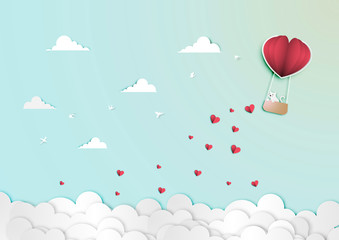 Paper art of Valentine Day Festival with White Cat in Paper Balloon Heart Shape Basket on The Blue Sky vector