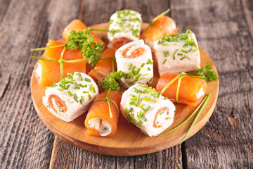 finger food with salmon and cheese