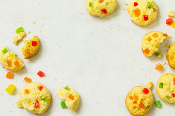 Cookies bar. Homemade cookies with candied fruit, isolate on a light stone table. Top view flat lay background. Copy space.