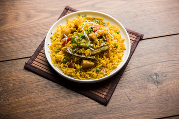 Masala Rice or masale bhat - is a spicy vegetable fried rice / biryani or Pulav usually made during wedding occassions in maharashtra, India