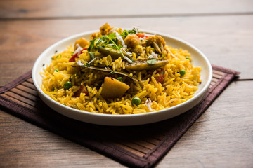 Masala Rice or masale bhat - is a spicy vegetable fried rice / biryani or Pulav usually made during wedding occassions in maharashtra, India