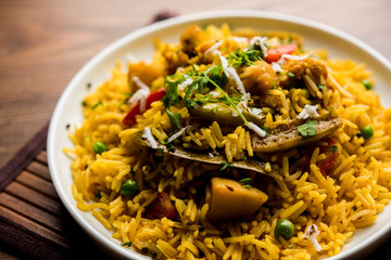 Masala Rice or masale bhat - is a spicy vegetable fried rice / biryani or Pulav usually made during wedding occassions in maharashtra, India