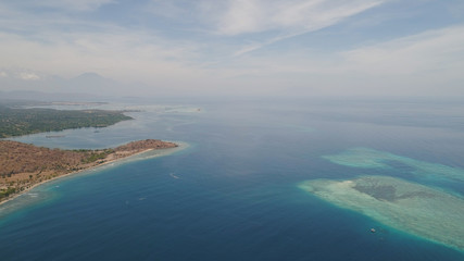 sea coast with tropical beach. aerial seascape tropical landscape, sea, boats on the surface water. Bali,Indonesia, travel concept.