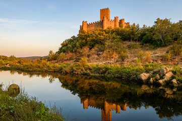 Castle of Almourol, an iconic Knights Templar fortress built on a rocky island in the middle of...