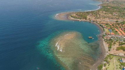 Fototapeta na wymiar Lagoon with turquoise water and the beach in the sea bay aerial view tropical landscape, sea, boats on the surface of the water. Bali,Indonesia, travel concept.