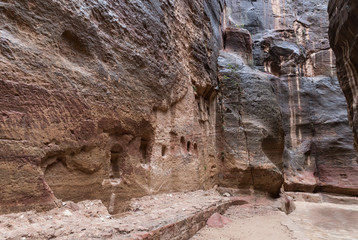 Al-Siq - canyon leading  through red-rock walls to Petra - the capital of the Nabatean kingdom in Wadi Musa city in Jordan