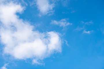 The sky is filled with beautiful clouds. The colors have a gradient and contrast.