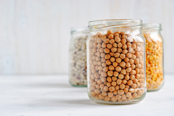 Glass jar of healthy dried chickpeas