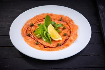 salmon carpaccio with lemon