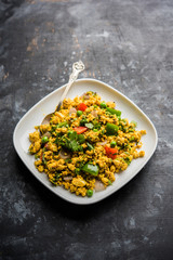 Paneer Bhurji, mildly spiced cottage cheese scramble and served with roti or laccha paratha, selective focus