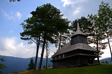 Old wooden Ukrainian Church stands high in the mountains