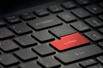 computer keyboard with red key enter