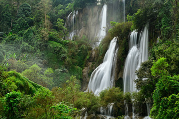 Great waterfall in Thailand. Beautiful waterfall in the green forest. Waterfall in tropical forest at Umpang National park, Tak, Thailand.