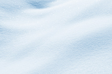 Obraz premium Fresh snow background texture. Winter background with snowflakes and snow mounds. Snow lumps.
