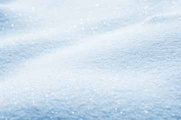 Obraz premium Fresh snow background texture. Winter background with snowflakes and snow mounds. Snow lumps.