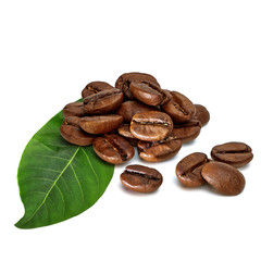 Roasted coffee beans and green leaf isolated on white background