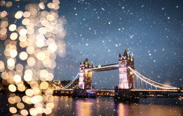 snowing in London, UK - winterholidays  in the city - obrazy, fototapety, plakaty