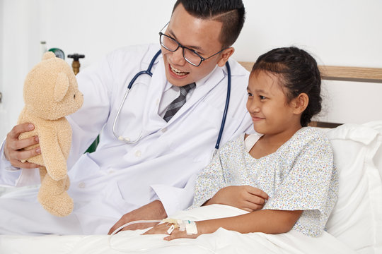 Little Girl And Doctor In Hospital