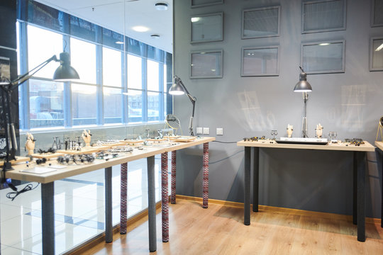 Background image of glass displays in luxury jewelry store, copy space