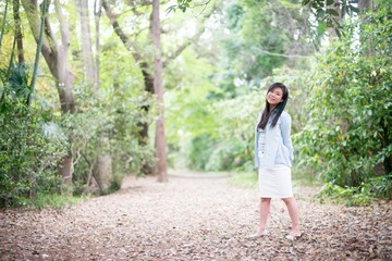 Asian female model poses for pictures on the street