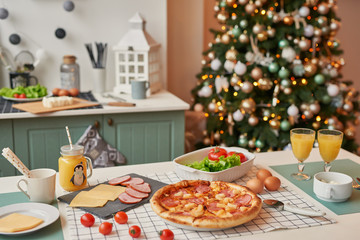 pizza with mozzarella on the Christmas table