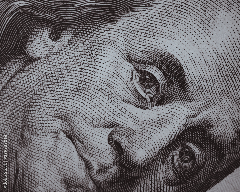 Wall mural benjamin franklin portrait one hundred dollar bill. macro shot. united states money close-up.