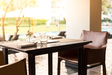 table in the restaurant on the sea background