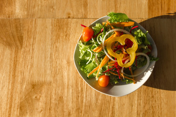 Salad in the morning on a wooden table