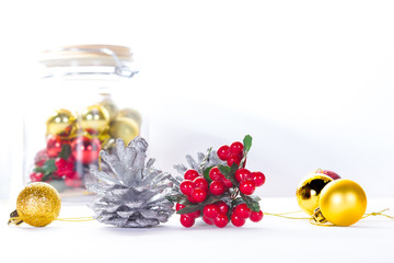 Bright shiny red and gold Christmas balls isolated on a white background