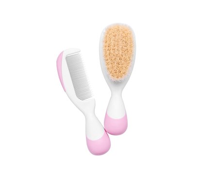 Set of baby hairbrushes for newborns. Close-up.